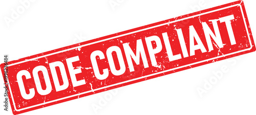 Red rubber stamp imprint saying CODE COMPLIANT in distressed white lettering angled