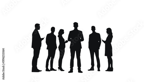 Team members stand together in a group to represent a collaborative office environment.