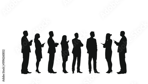 Businesspeople stand in a line to represent a diverse professional team working in a corporate office.