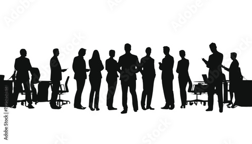 Businesspeople stand together in a group to discuss professional strategies during a busy office day.