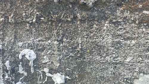 Dirty Weathered Concrete Wall Texture Background. Grunge wall surface with stains, cracks, and rough texture, ideal for urban backgrounds