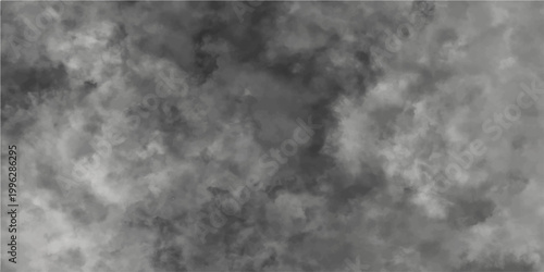 Abstract smoke swirling with shades of grey creating artistic vapor patterns and textural movement evoking atmospheric depth and visual interest.