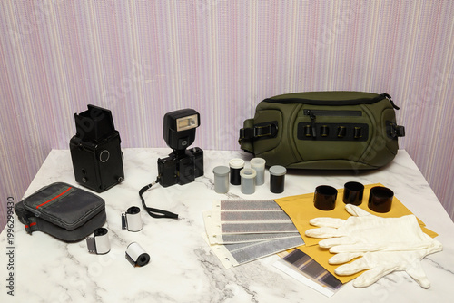 equipment for film photography and development on a table