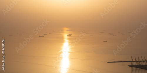 Obraz na plátně Cargo ships halted at sea due to Strait of Hormuz disruption and global trade cr