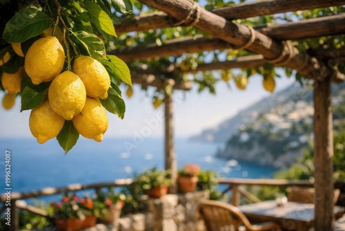 Beautiful view of Amalfi on the Mediterranean coast with lemons in the foreground, Italy