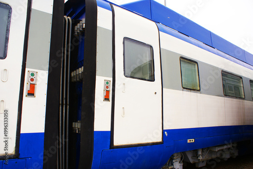Old brightly painted commuter train. Train. Travel.