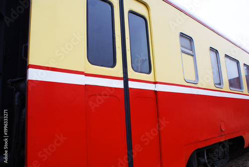 Old brightly painted commuter train. Train. Travel.