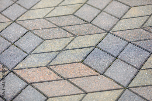 Obraz na plátně Interlocking paving stones forming a repeating three dimensional cube pattern, c