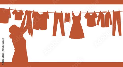 Woman hanging laundry on clothesline outdoors