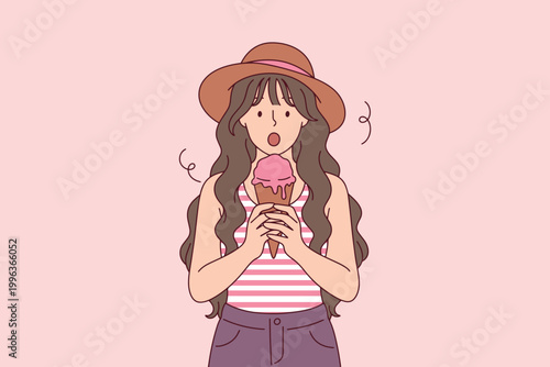 A young woman wearing a summer hat looks with wide-eyed surprise and amazement at a gigantic pink ice cream cone she is holding during a vacation trip.