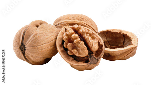 Photos Whole and cracked walnuts with exposed kernels, isolated on transparent backgrou