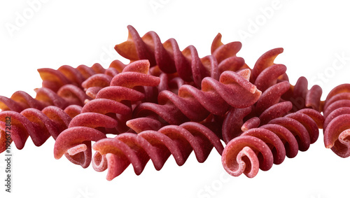 Fotografie Pile of red fusilli pasta spirals, isolated on transparent background