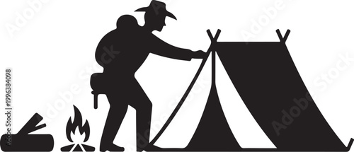 Silhouette of a pioneer setting up a camp with tent and fire