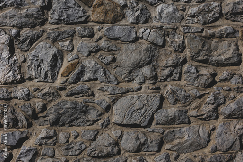 Dark grey outdoor building gravel material wall, Abstract black stone cobble surface, Rock texture, Pebble ground pattern, Can be used as background for display or montage your products.