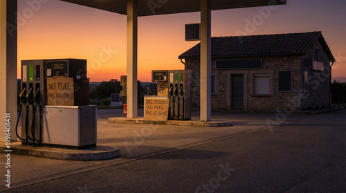 Gas station with no fuel signs at sunset energy shortage concept