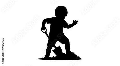 Silhouette of a young child actively digging in a pile of dirt with a small shovel, depicting playful outdoor activity.