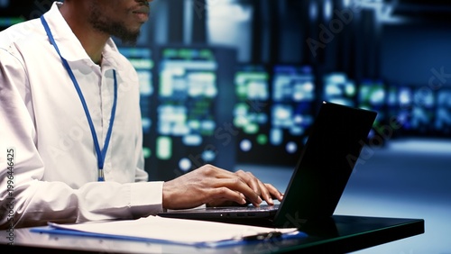 Photos Engineer preventing strain on data center infrastructure caused by artificial intelligence applications driving up power usage