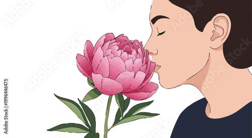 Woman in profile smelling fragrant pink peony bloom with eyes closed