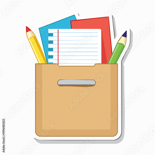 Cardboard box with stationery and writing tools