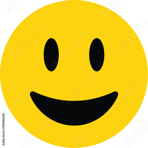 A happy yellow circle with a smiling face, featuring two black oval eyes and a curved black mouth, representing joy