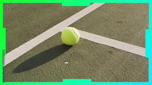White bars appearing and teal border cropping while tennis ball settling, rotating, revealing court