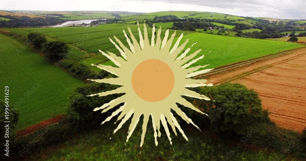 Fototapeta premium Displaying large stylized sun graphic covering rolling green pasture and golden field on farm