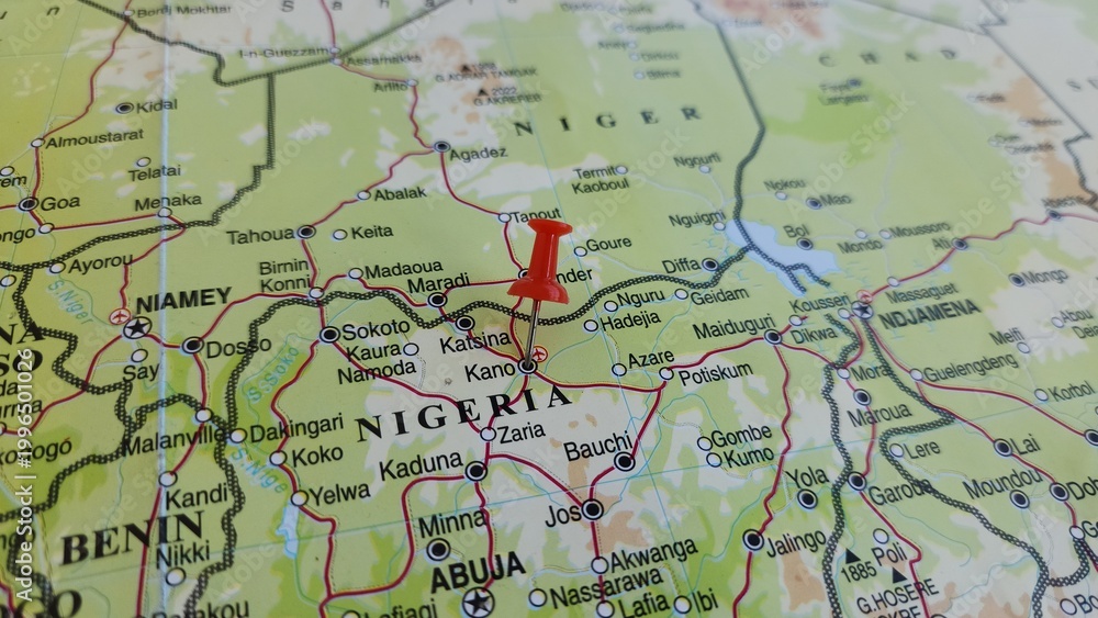 Fototapeta premium View of Kano, is a city in northern Nigeria and the capital of Kano State, It is the second largest city in Nigeria after Lagos, on a geographical map of Africa, marked with red push pin