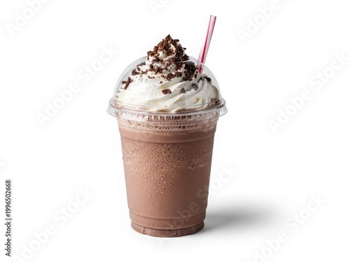 A delicious chocolate shake with whipped cream and chocolate chips on top.