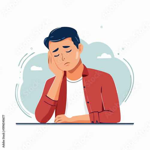 Man looking bored and tired, resting his head on his hand