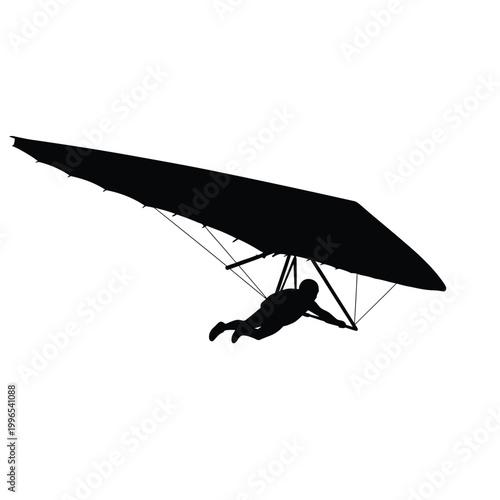 Silhouette of a person enjoying the thrill of hang gliding sport