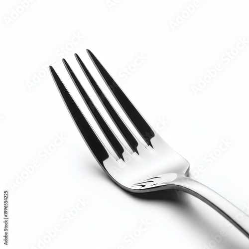 A shiny silver fork on a clean white background