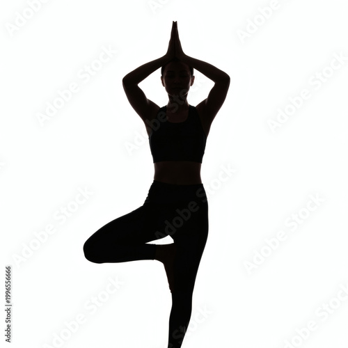A woman in a yoga pose against a white background