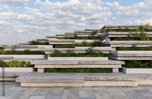 A modern outdoor seating area with a unique, tiered design and lush greenery under a cloudy sky