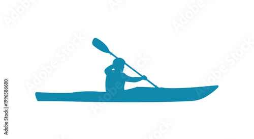 Silhouette of a Kayaker Paddling a Kayak.