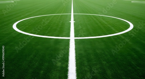 Football field center line and circle on green grass soccer pitch