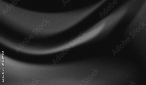 Foto Illustration of a luxury, jet black silk or satin fabric with a metallic sheen on its curves and a strong grain texture