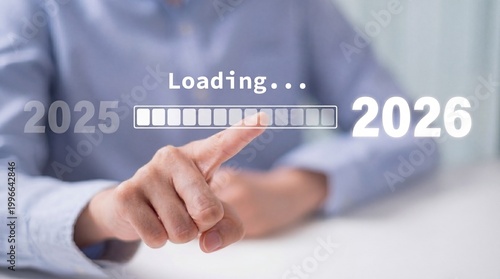 A man in a blue shirt interacting with a loading progress bar