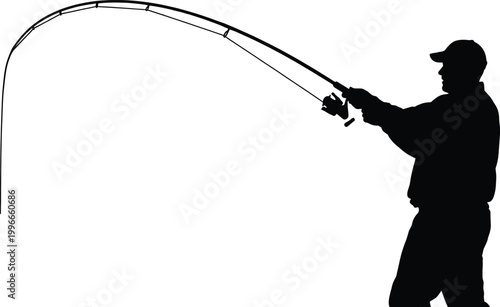 Silhouetted fisherman with bent rod a moment of intense fishing action
