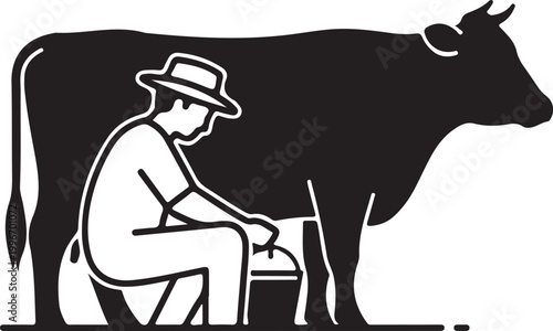 Man milking a black cow