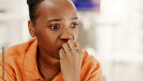 Fotografie Stress, anxiety and black woman biting nails in home scared for unemployment, failure or mistake