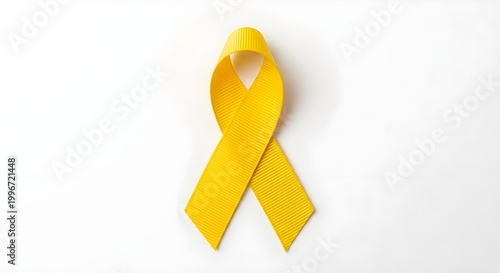 Yellow ribbon symbol isolated on white concept of hope support and awareness