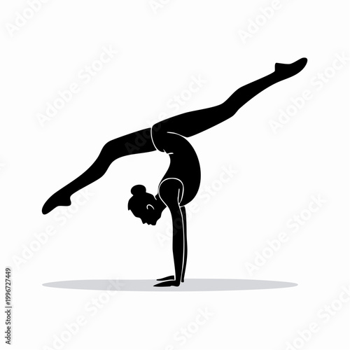 Silhouette of a gymnast performing a handstand split