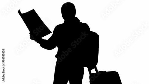 Traveler silhouette with map and luggage standing alone in black