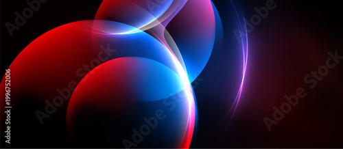 Abstract vibrant shapes blend, creating dynamic light effects. Red, blue hues dominate dark background. Smooth curves suggest movement.
