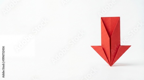 Free Download A red origami arrow points downward on a surface with copyspace for finance and security concepts. - GFXLoad