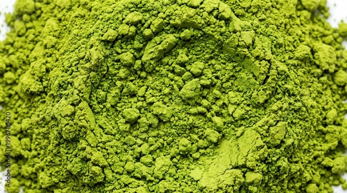 Bright green powdered matcha tea granules in close up view