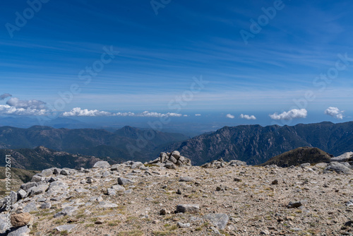 Rocky mountain peak landscape overlooking Corsica valleys