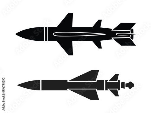Two black silhouette missiles with fins and warhead ready for launch symbolizing weaponry.