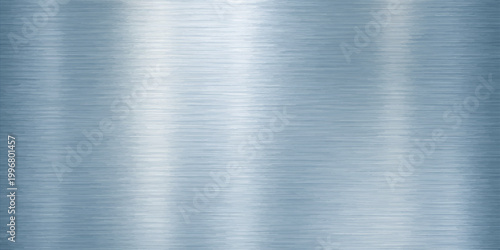 A polished stainless steel plate with a brushed metallic texture creates a smooth grey aluminum surface featuring an industrial silver pattern and shiny reflections on the material sheet