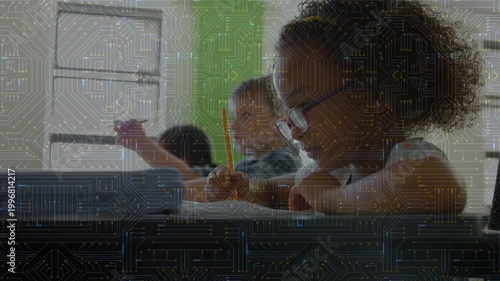 Camera panning classroom row, student with glasses writing workbook, classmates signaling for help